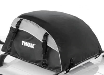 Black waterproof Jeep Carrier Kit luggage roof bag with straps mounted on roof bars