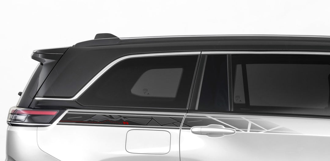 Trail-inspired body side decal on Jeep Meridian, showcasing rugged, outdoor-ready design and durable finish.